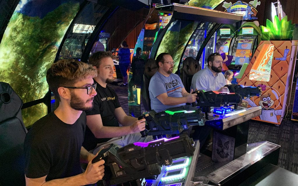 Some of the Simple Thread team enjoying the arcade.